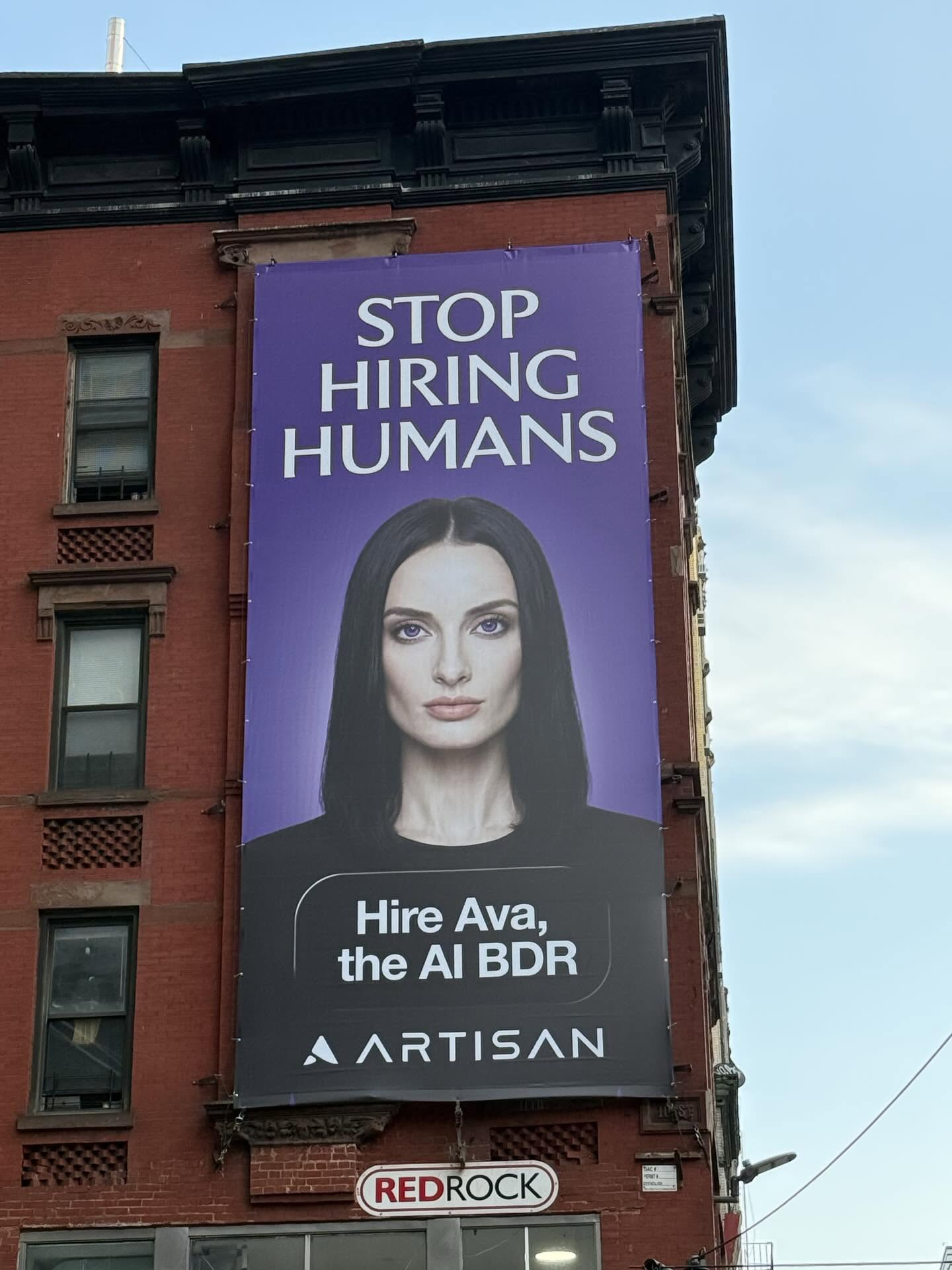 Artisan 'Stop hiring humans' billboard